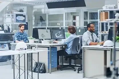 Image of multiple people working in a lab-like setting